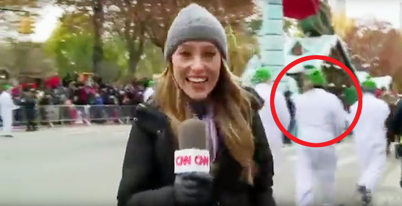That's me (circled) behind the CNN chick. Sorry again, Stan and Ollie, for siphoning ratings from "March of the Wooden Soldiers."